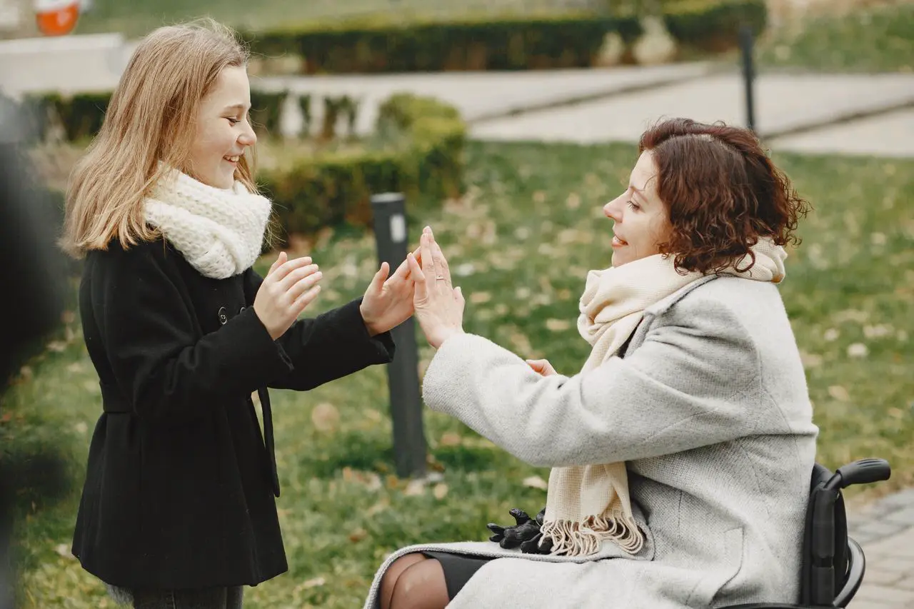 Friends sharing a positive moment during community participation