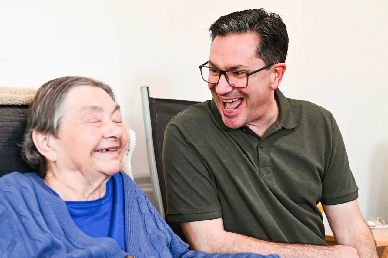 Support worker spending meaningful time with an older adult